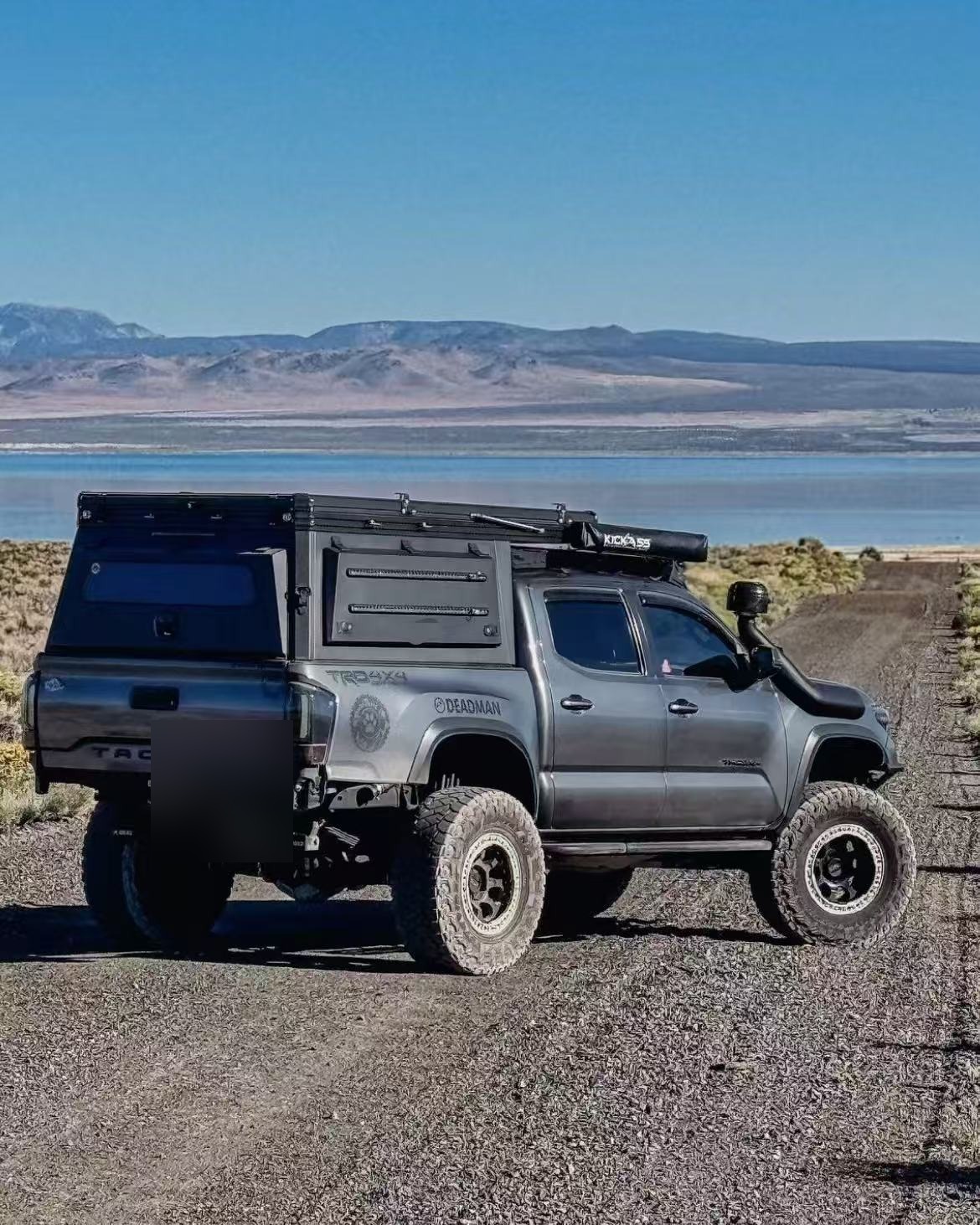 Toyota Tacoma canopy in an overland setting